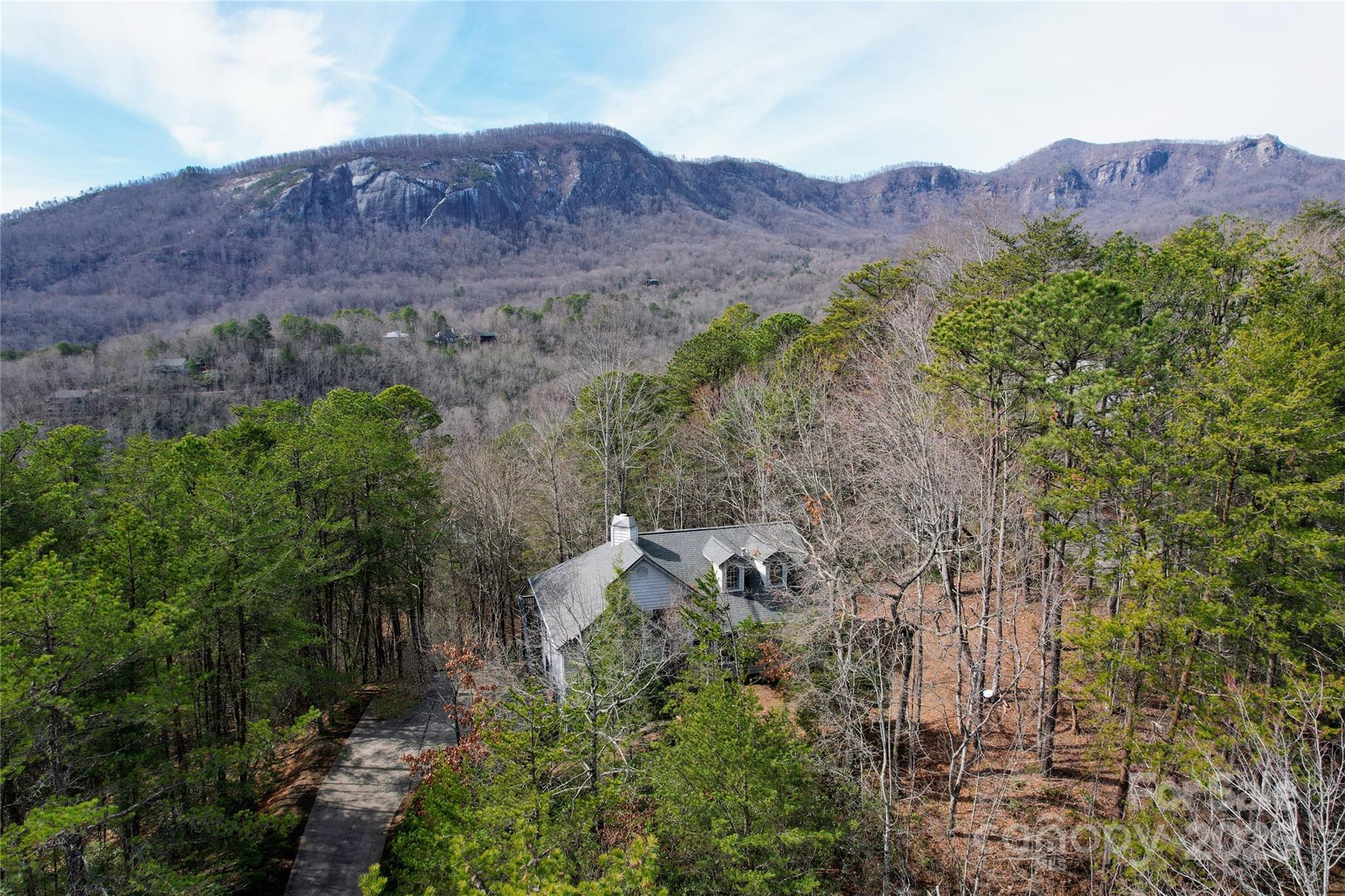 212 Ridgeway Road Lake Lure, NC 28746 - Photo 12 of 44 an aerial view of a house and mountain view