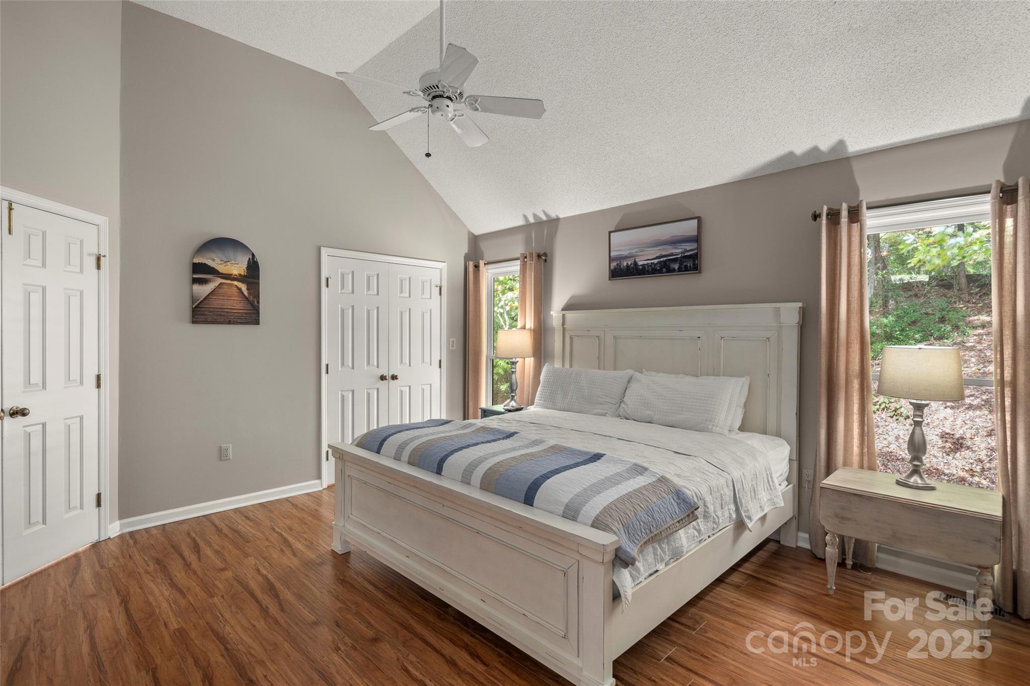 212 Ridgeway Road Lake Lure, NC 28746 - Photo 22 of 44 a bedroom with a bed and window