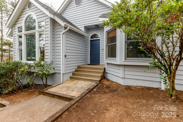 a view of a house with a patio