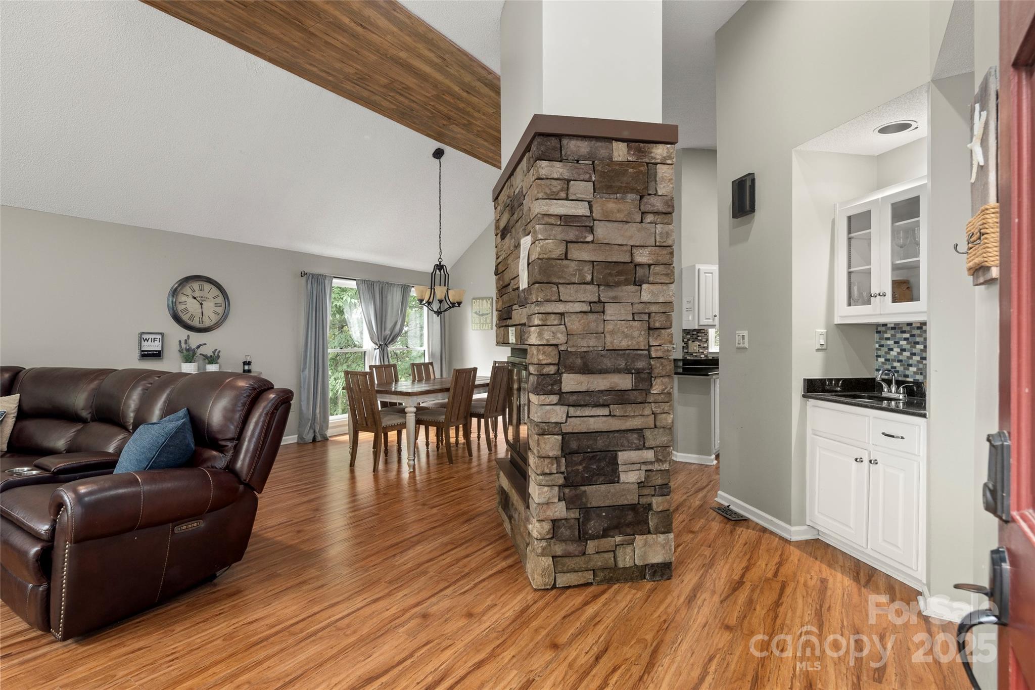 212 Ridgeway Road Lake Lure, NC 28746 - Photo 35 of 44 a living room with furniture and wooden floor