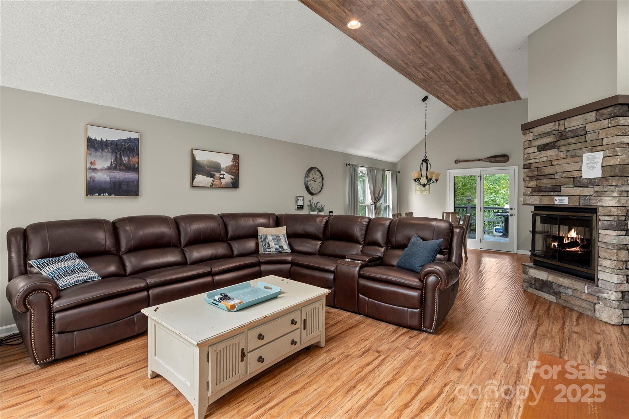 212 Ridgeway Road Lake Lure, NC 28746 - Photo 37 of 44 a living room with furniture and a fireplace