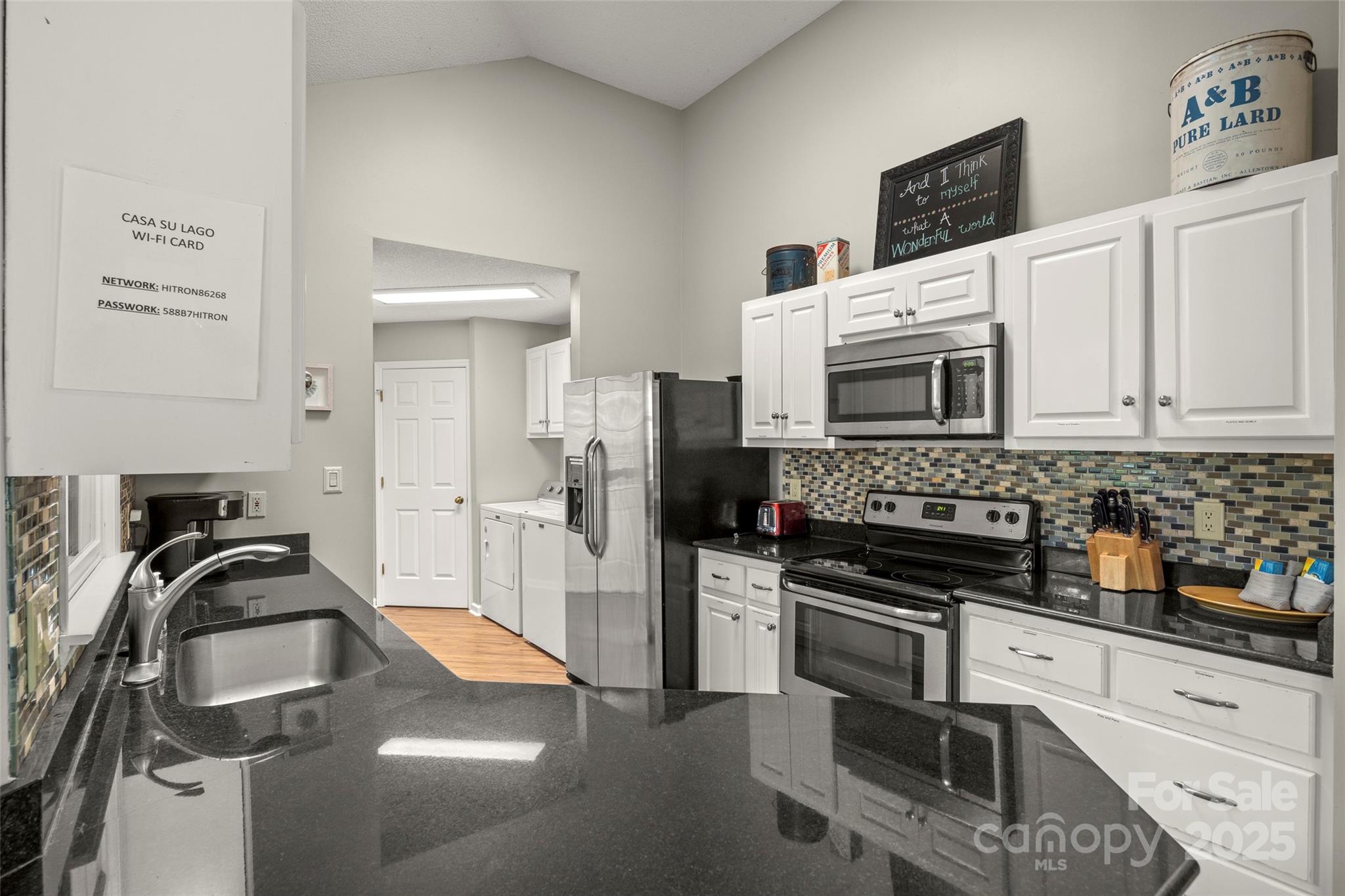 212 Ridgeway Road Lake Lure, NC 28746 - Photo 41 of 44 a kitchen with stainless steel appliances a sink a stove and cabinets