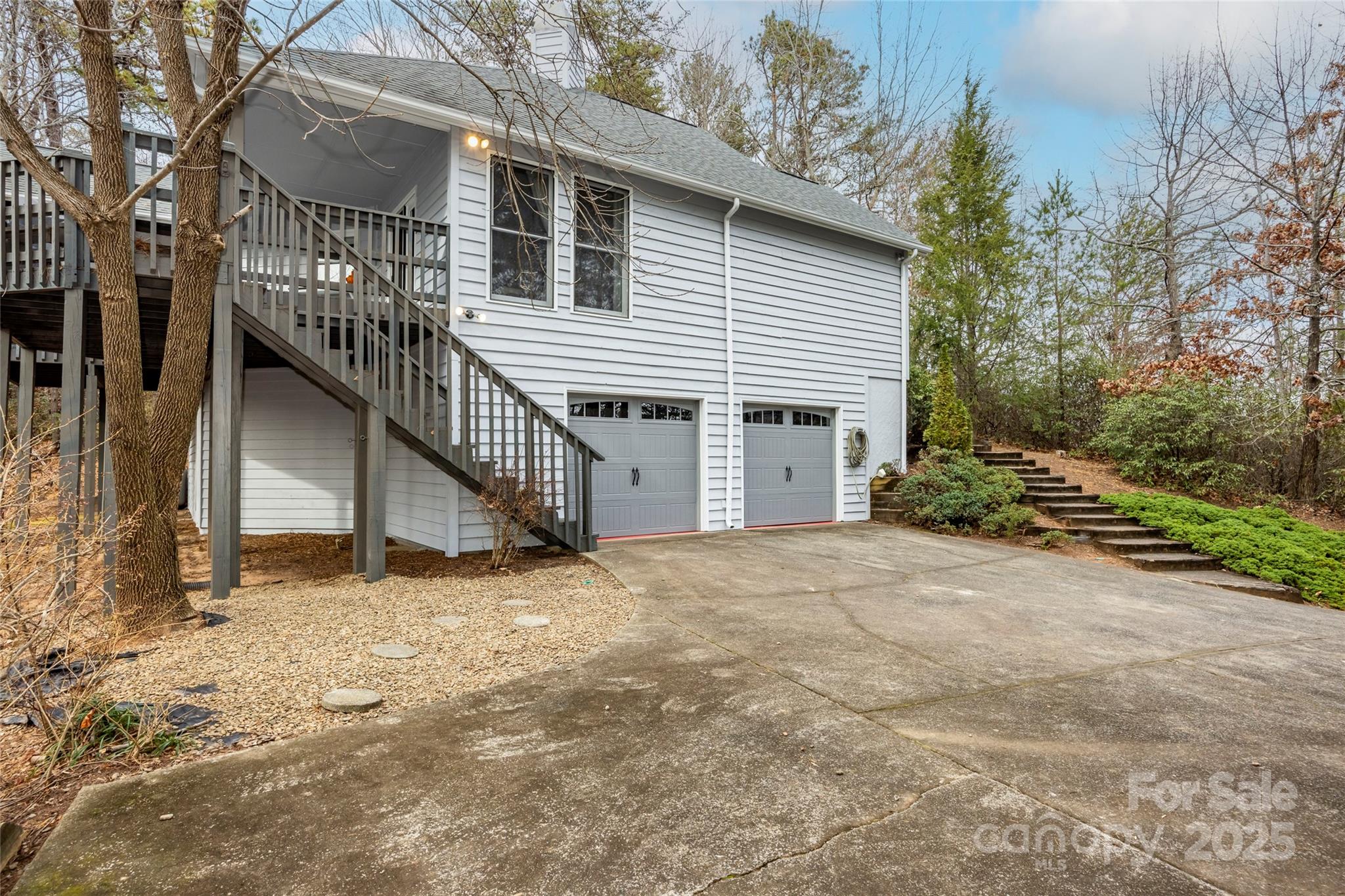 212 Ridgeway Road Lake Lure, NC 28746 - Photo 5 of 44 a view of a house with a yard