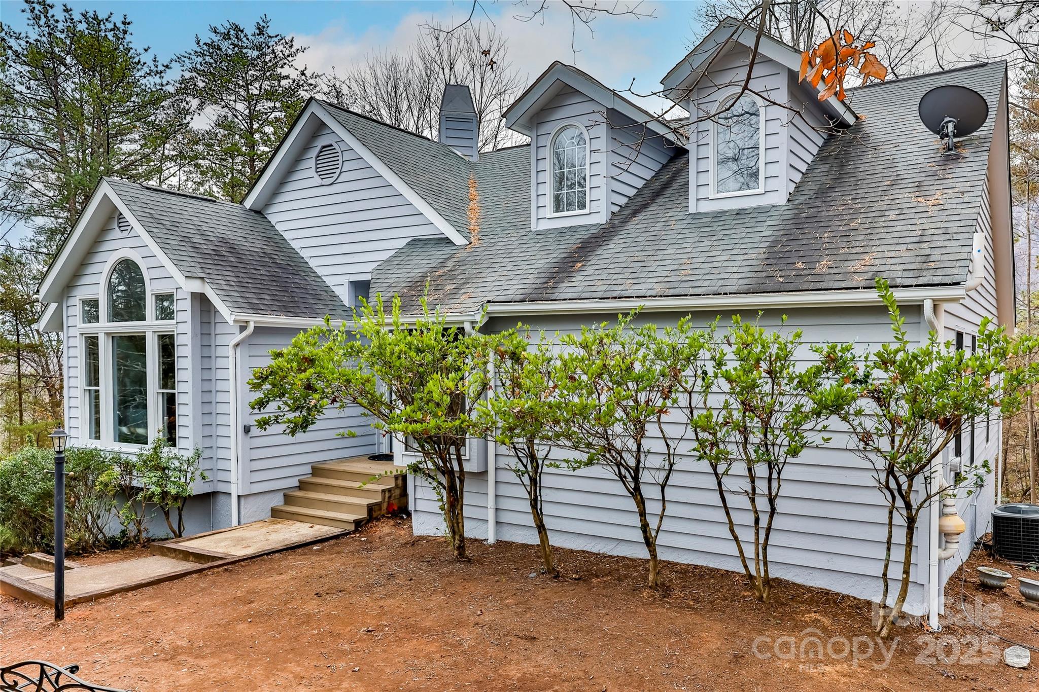 212 Ridgeway Road Lake Lure, NC 28746 - Photo 6 of 44 a view of a house with a yard