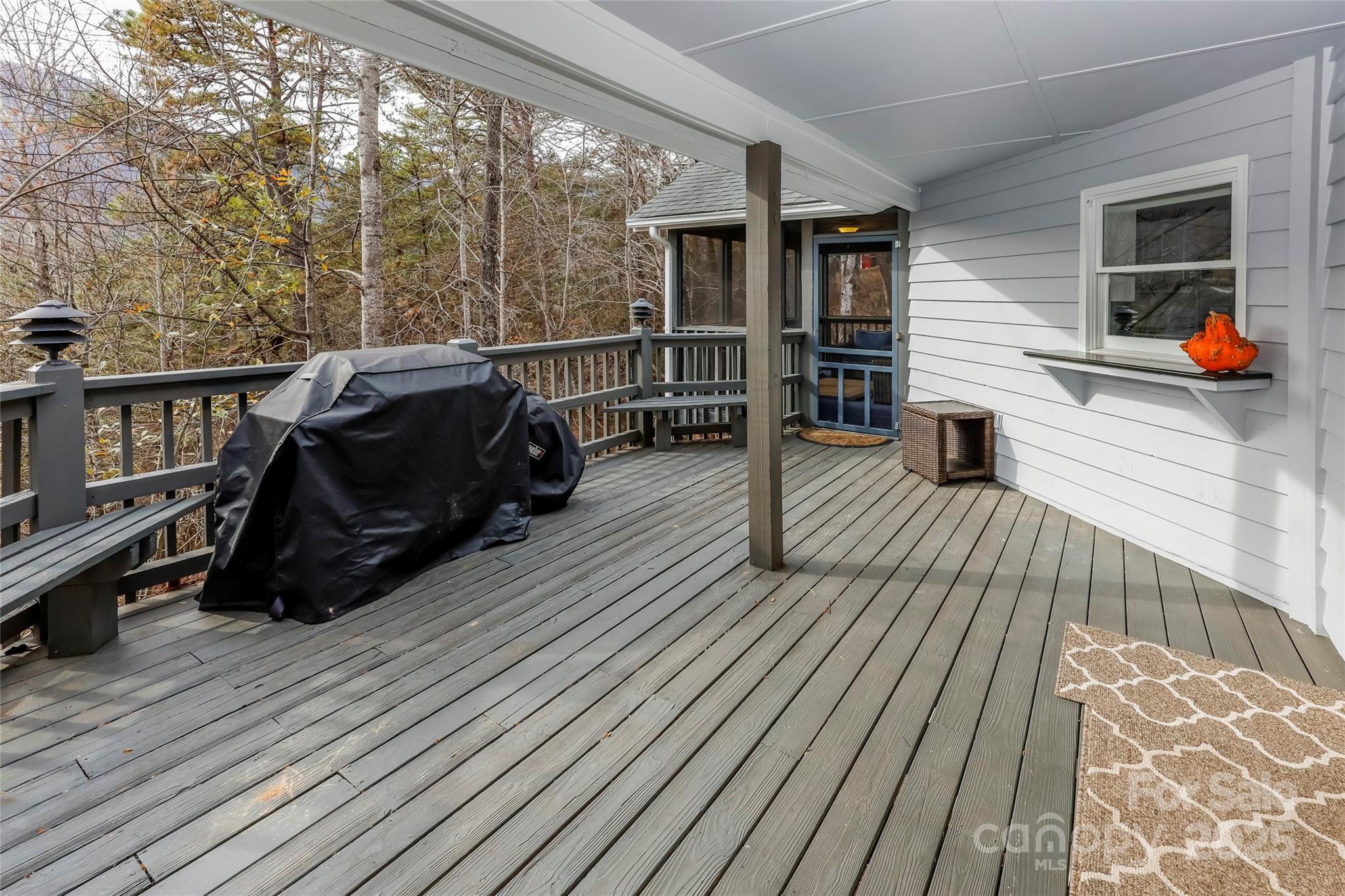 212 Ridgeway Road Lake Lure, NC 28746 - Photo 7 of 44 a view of deck with wooden floor and seating space