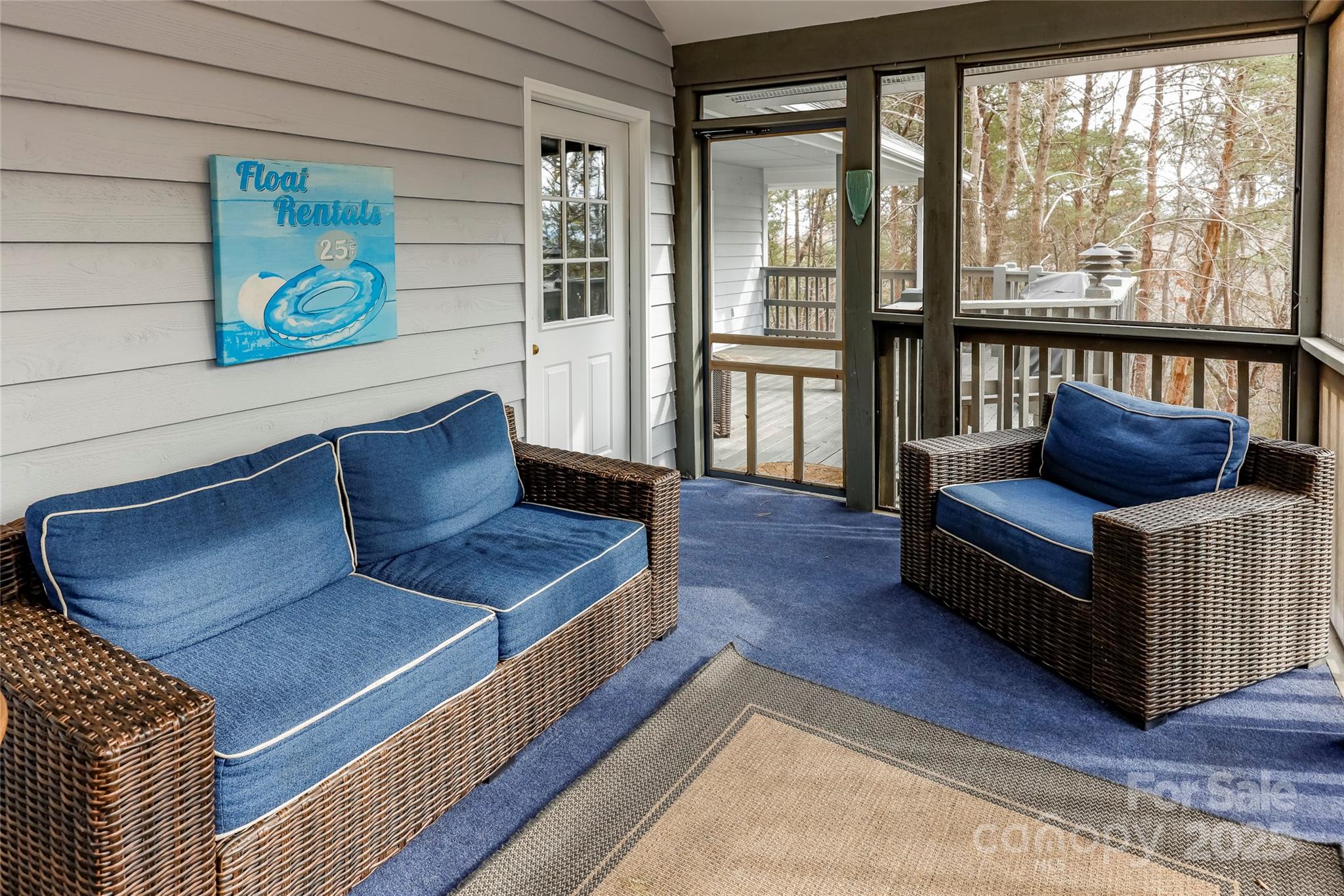 212 Ridgeway Road Lake Lure, NC 28746 - Photo 10 of 44 a living room with furniture and a window