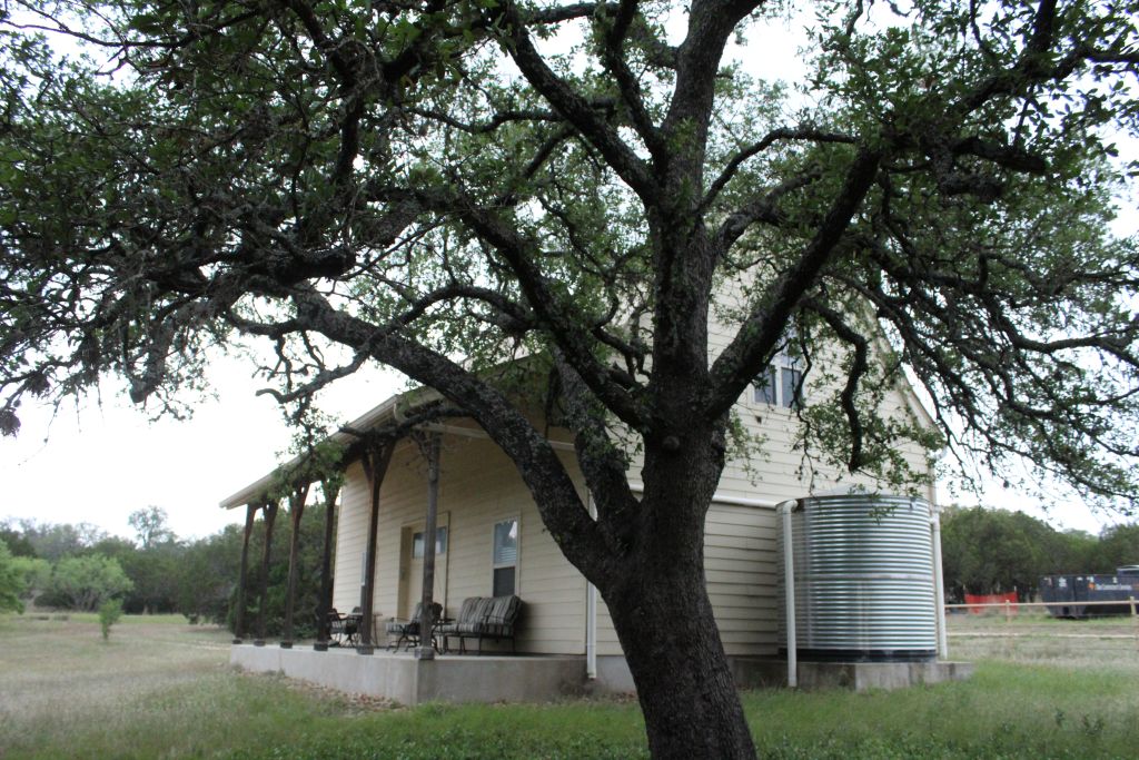5135 Lookout Ridge Drive Marble Falls, TX 78654 - Photo 29 of 33 Covered patio on barn with water collection cistern