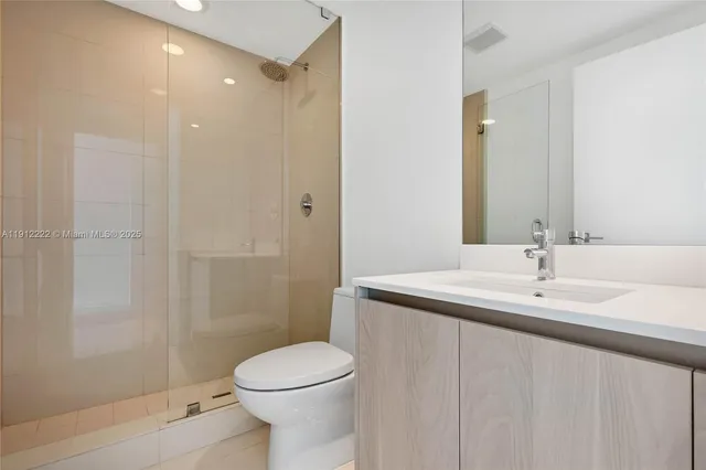 a view of a swimming pool with a garden and trees