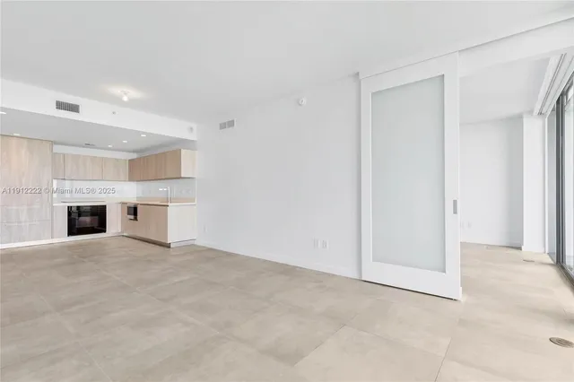 a view of a backyard with swimming pool