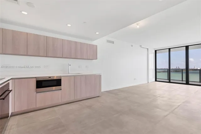 a view of an ocean and a mountain