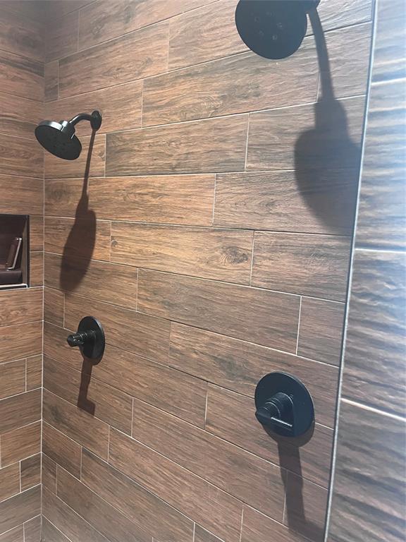 13831 Friendship Road Pilot Point, TX 76258 - Photo 11 of 31 Double shower heads in very big tiled shower in primary bathroom