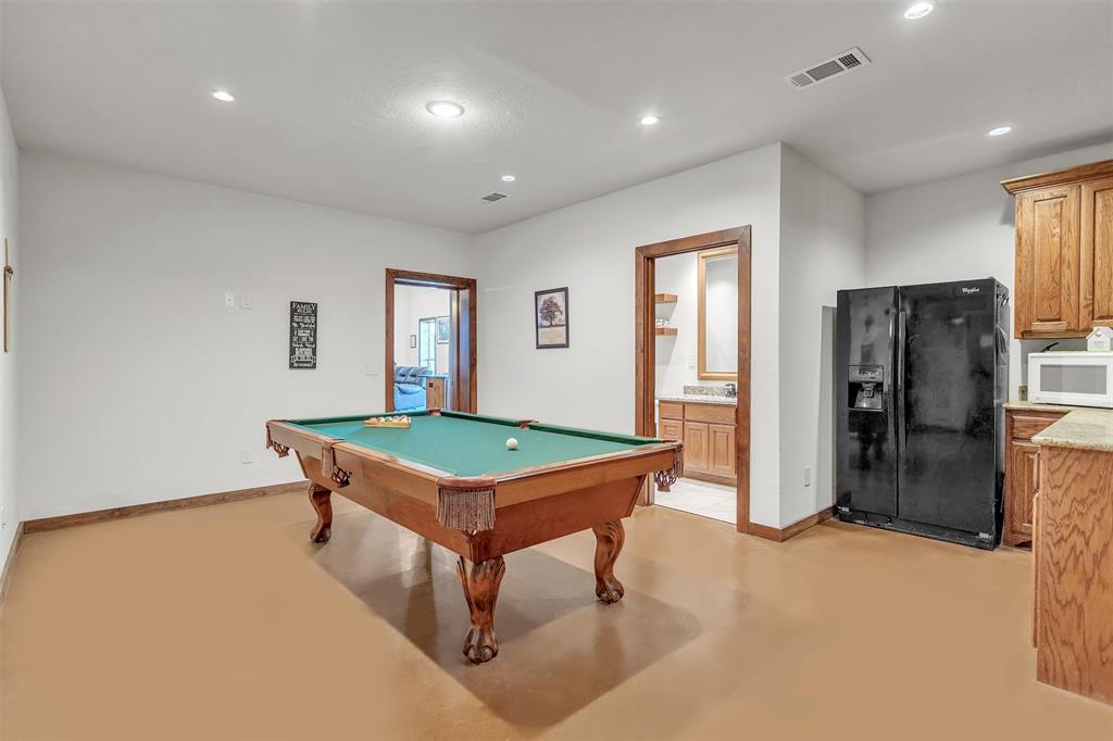13831 Friendship Road Pilot Point, TX 76258 - Photo 14 of 31 Playroom featuring recessed lighting, concrete flooring, and pool table