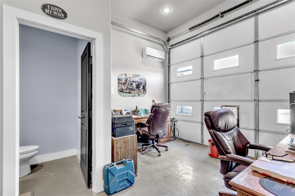 13831 Friendship Road Pilot Point, TX 76258 - Photo 21 of 31 a view of a workspace with furniture
