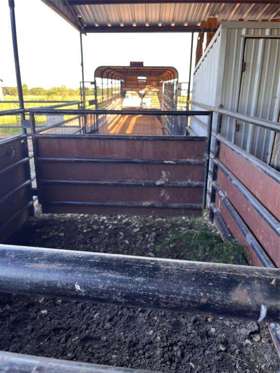 13831 Friendship Road Pilot Point, TX 76258 - Photo 25 of 31 View of horse barn or cattle barn with a chute to load or unload animals