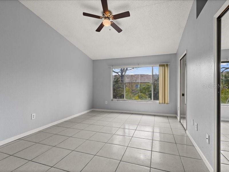 29924 Playa Del Rey Lane Wesley Chapel, FL 33543 - Photo 19 of 31 a view of an empty room with a window