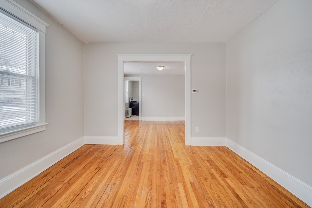 35 Stuart Street Springfield, MA 01119 - Photo 17 of 34 a view of a room with wooden floor and natural light