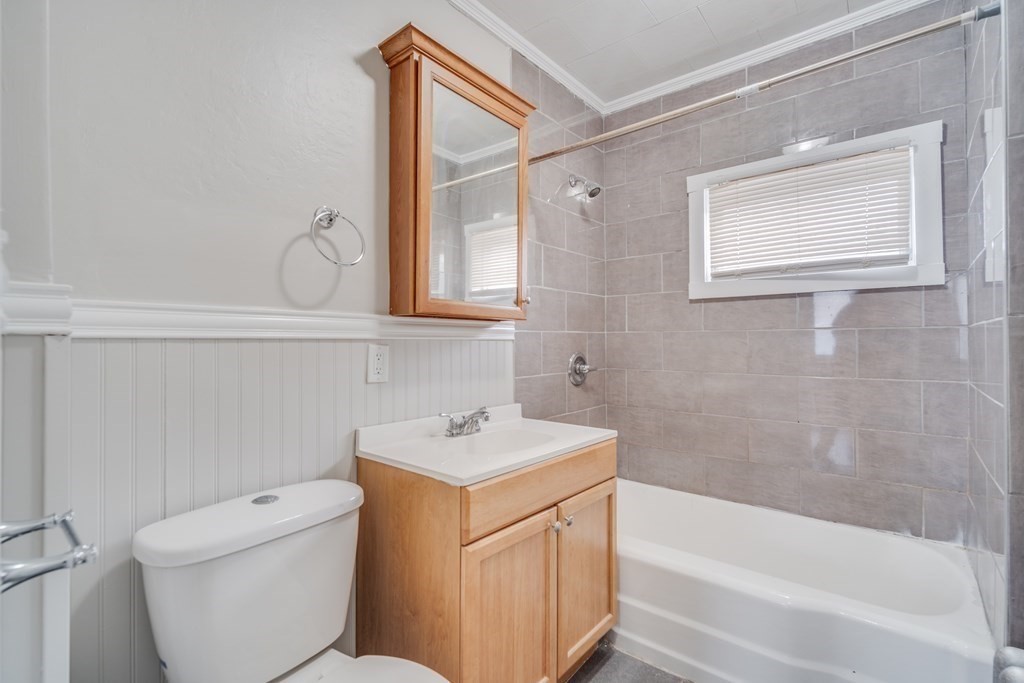 35 Stuart Street Springfield, MA 01119 - Photo 20 of 34 a bathroom with a sink a toilet and bathtub