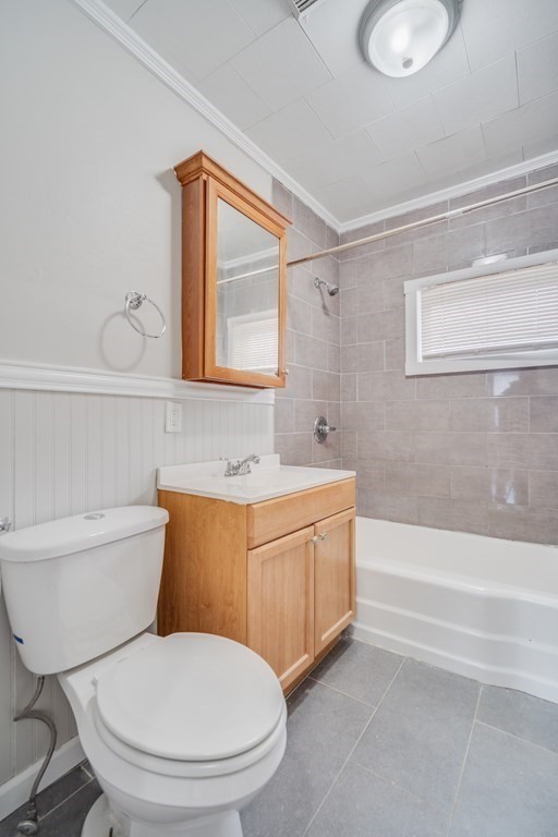 35 Stuart Street Springfield, MA 01119 - Photo 21 of 34 a bathroom with a toilet a sink and bathtub