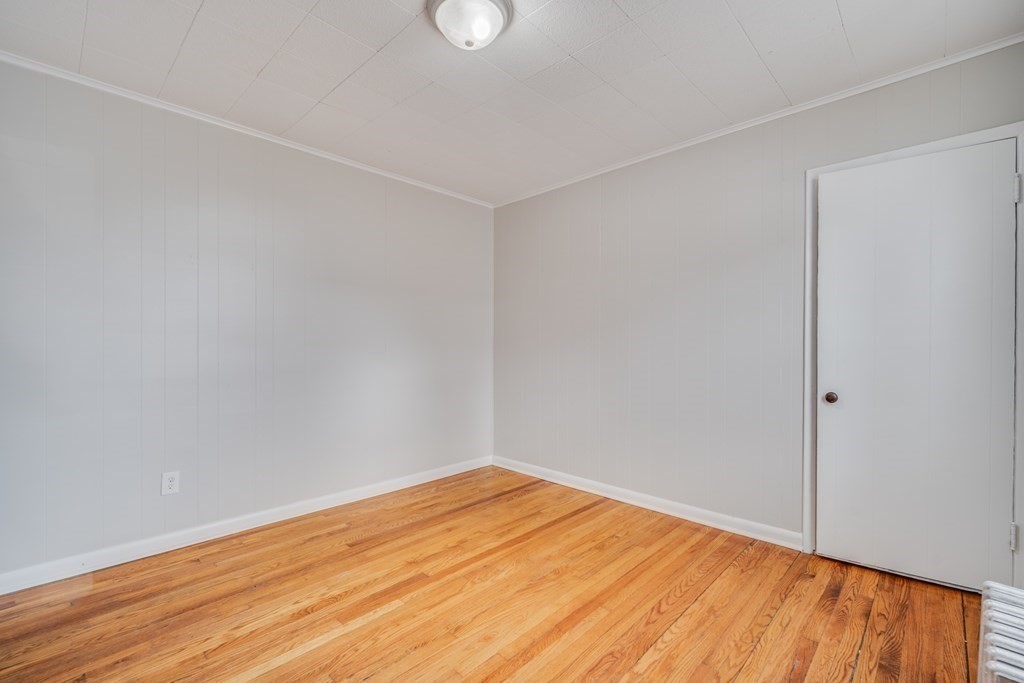 35 Stuart Street Springfield, MA 01119 - Photo 23 of 34 a view of empty room with wooden floor