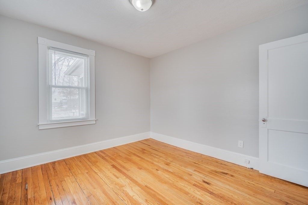 35 Stuart Street Springfield, MA 01119 - Photo 27 of 34 a view of empty room with wooden floor