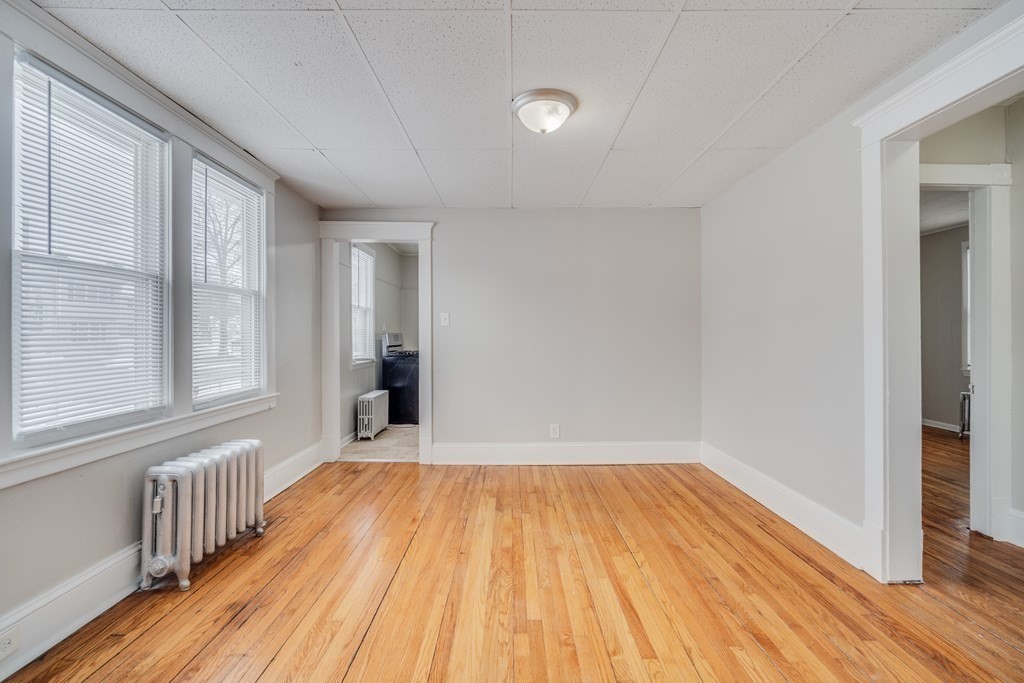 35 Stuart Street Springfield, MA 01119 - Photo 28 of 34 a view of a room with wooden floor and fence