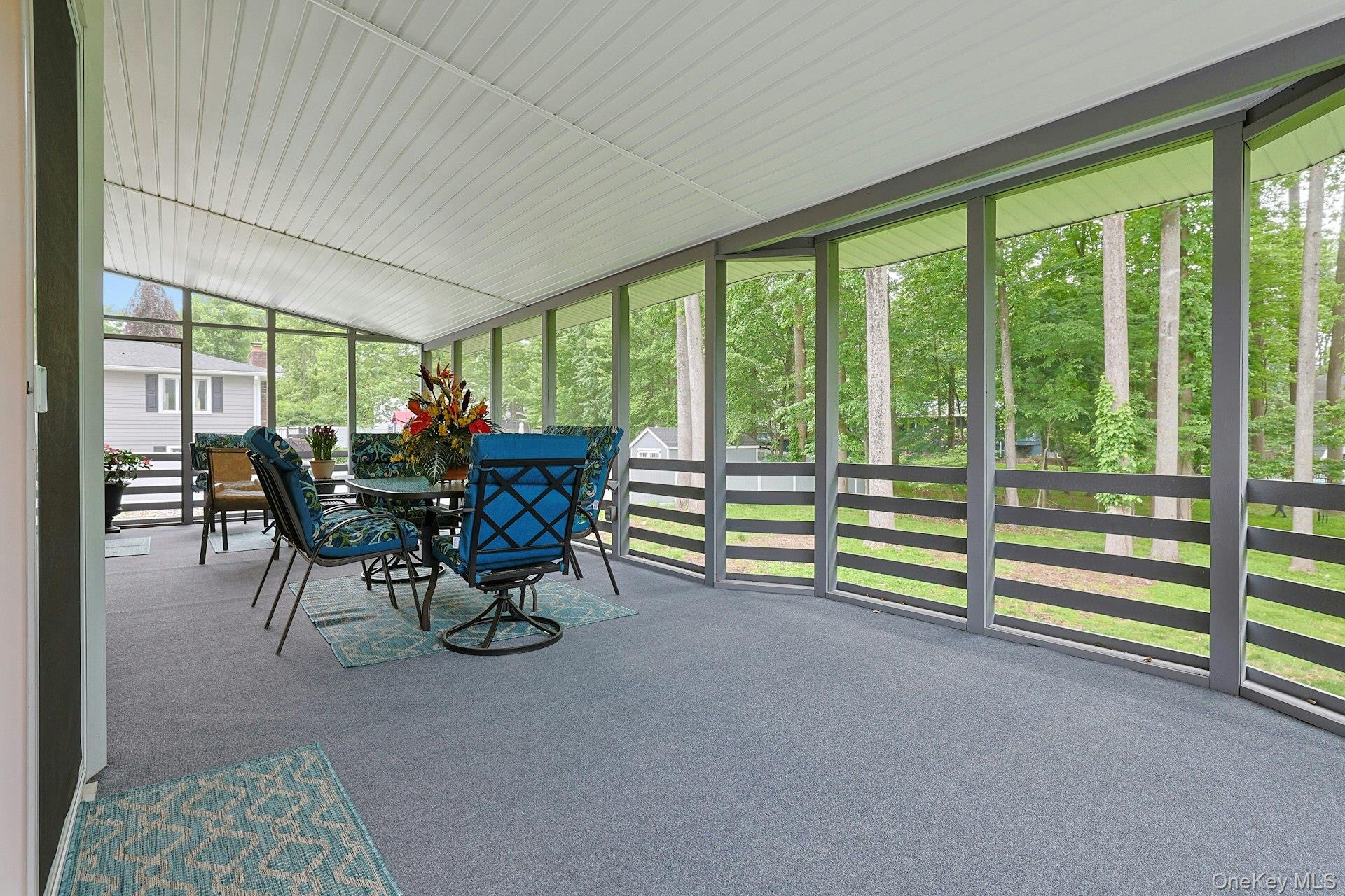 8 Dunmore Road New City, NY 10956 - Photo 29 of 48 a view of a big room with furniture and floor to ceiling windows