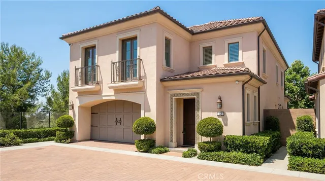 a front view of a house with yard