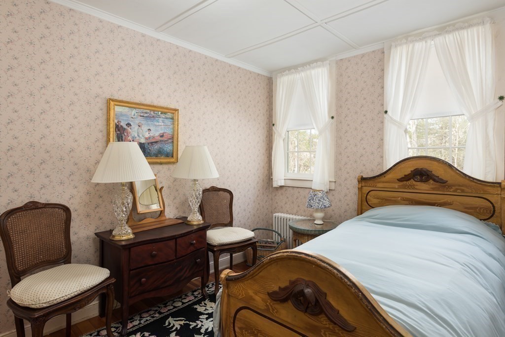 16 Jefferson Shores Road Wareham, MA 02532 - Photo 15 of 28 a bedroom with a bed chair and window