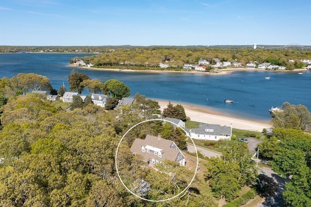 16 Jefferson Shores Road Wareham, MA 02532 - Photo 2 of 28 a view of a lake with a mountain