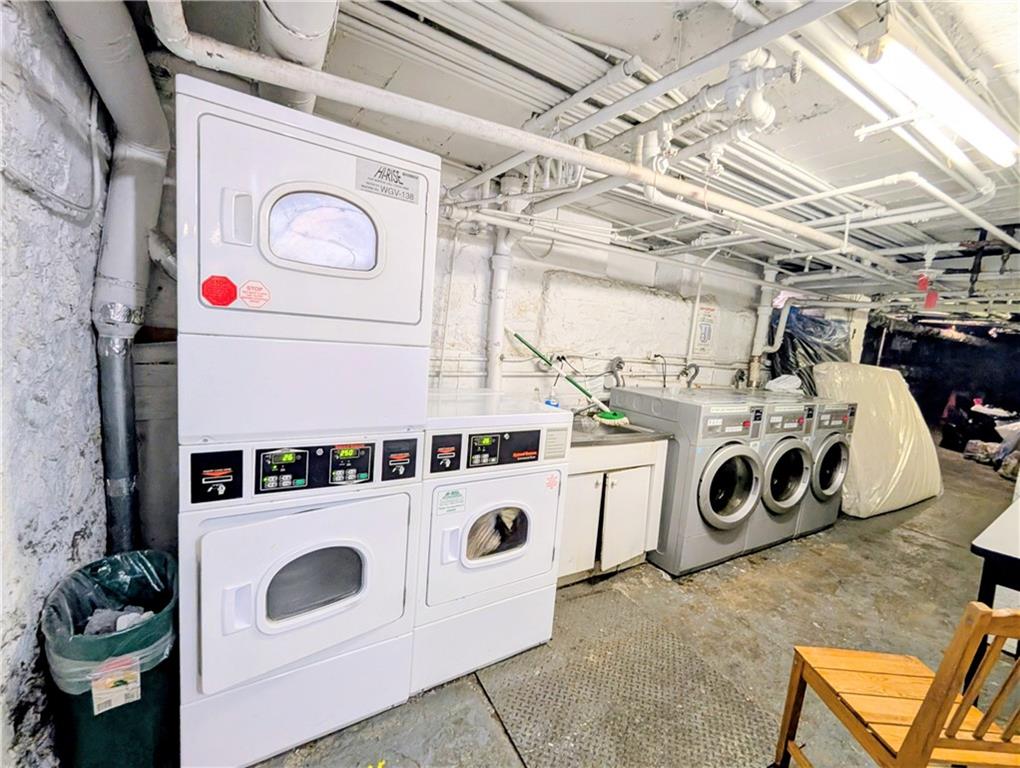 7501 Ridge Boulevard, Unit 2E Brooklyn, NY 11209 - Photo 13 of 13 a utility room with dryer and washer