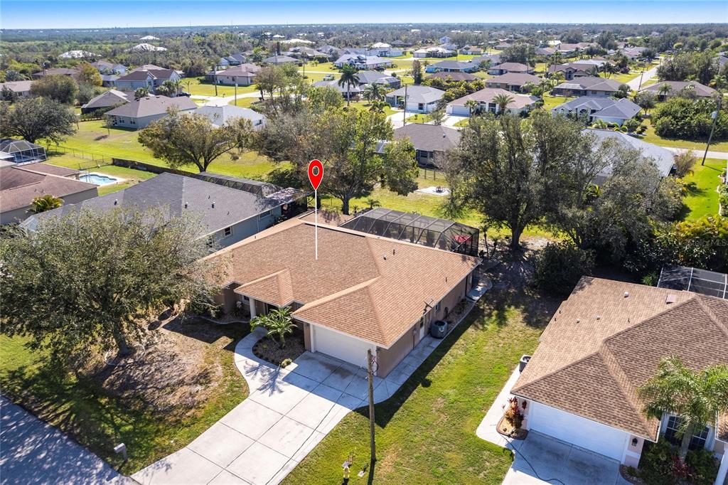 27199 Punta Cabello Court Punta Gorda, FL 33983 - Photo 1 of 45 an aerial view of a house with a swimming pool yard and outdoor seating