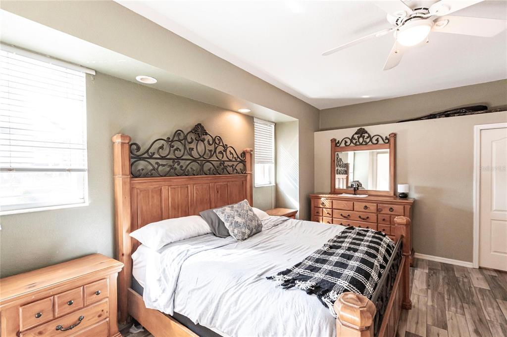 27199 Punta Cabello Court Punta Gorda, FL 33983 - Photo 20 of 45 a bedroom with a bed and a window