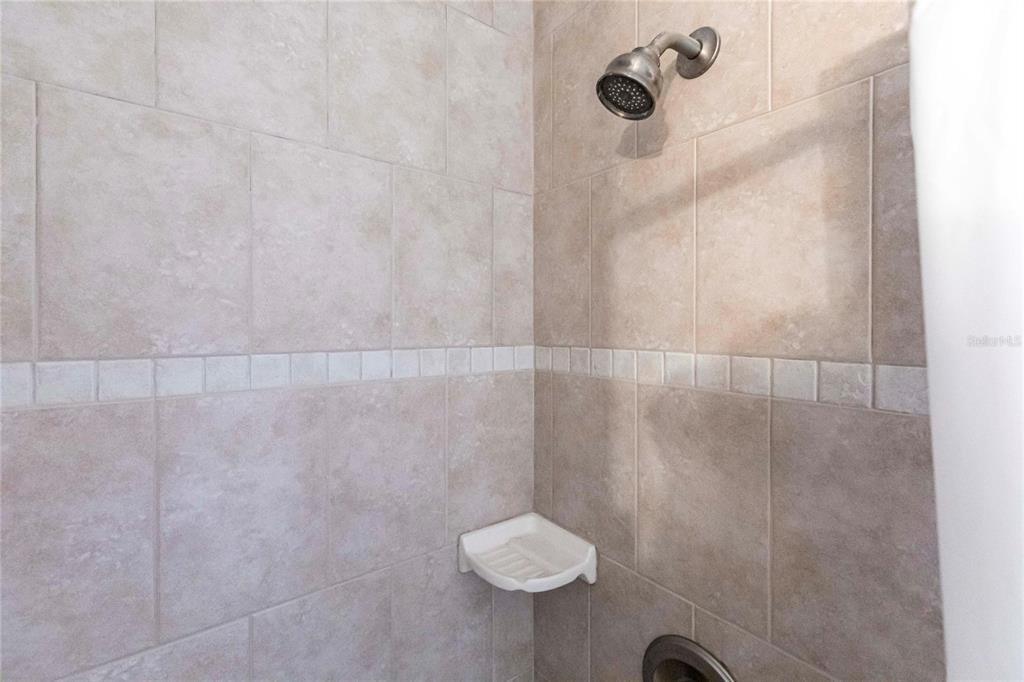 27199 Punta Cabello Court Punta Gorda, FL 33983 - Photo 33 of 45 a bathroom with a shower