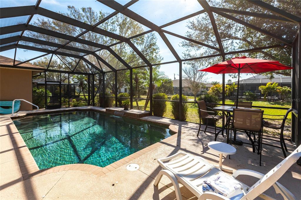 27199 Punta Cabello Court Punta Gorda, FL 33983 - Photo 41 of 45 a view of swimming pool with outdoor seating