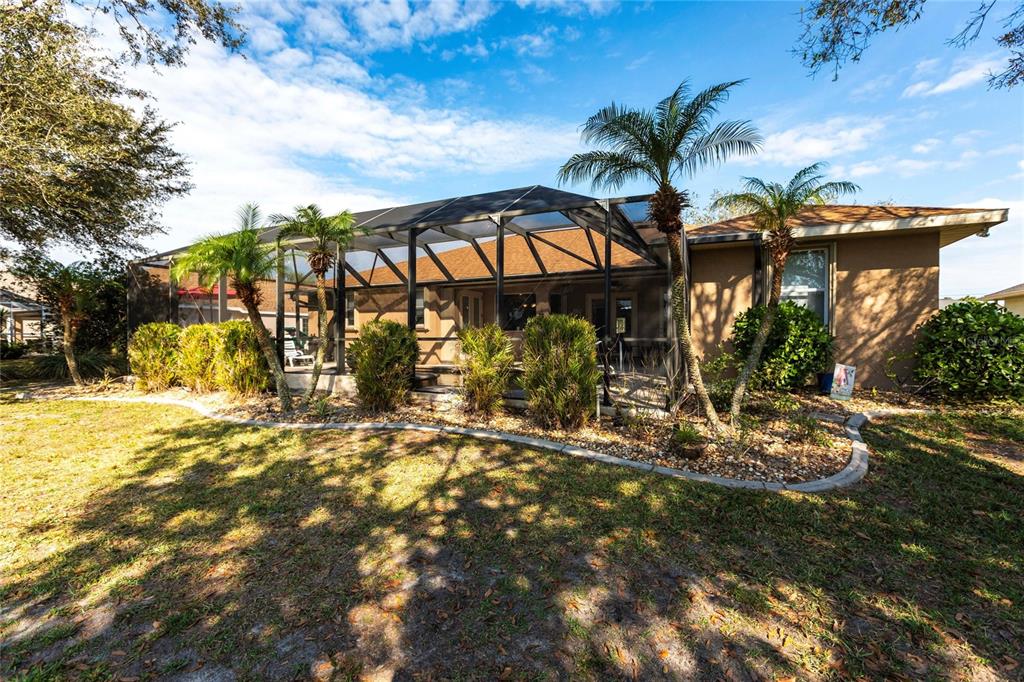 27199 Punta Cabello Court Punta Gorda, FL 33983 - Photo 43 of 45 a view of a house with a yard