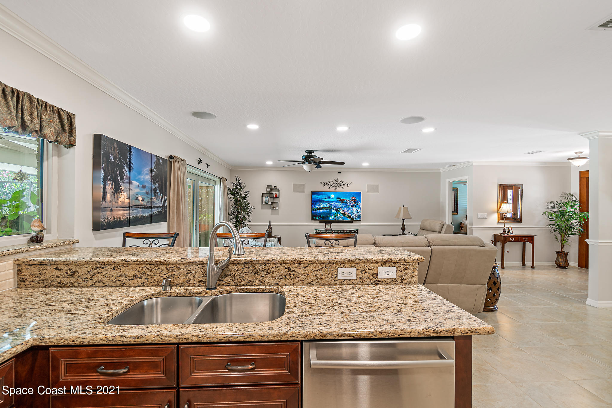 539 Lanternback Island Drive Satellite Beach, FL 32937 - Photo 14 of 54 a kitchen with stove and cabinets