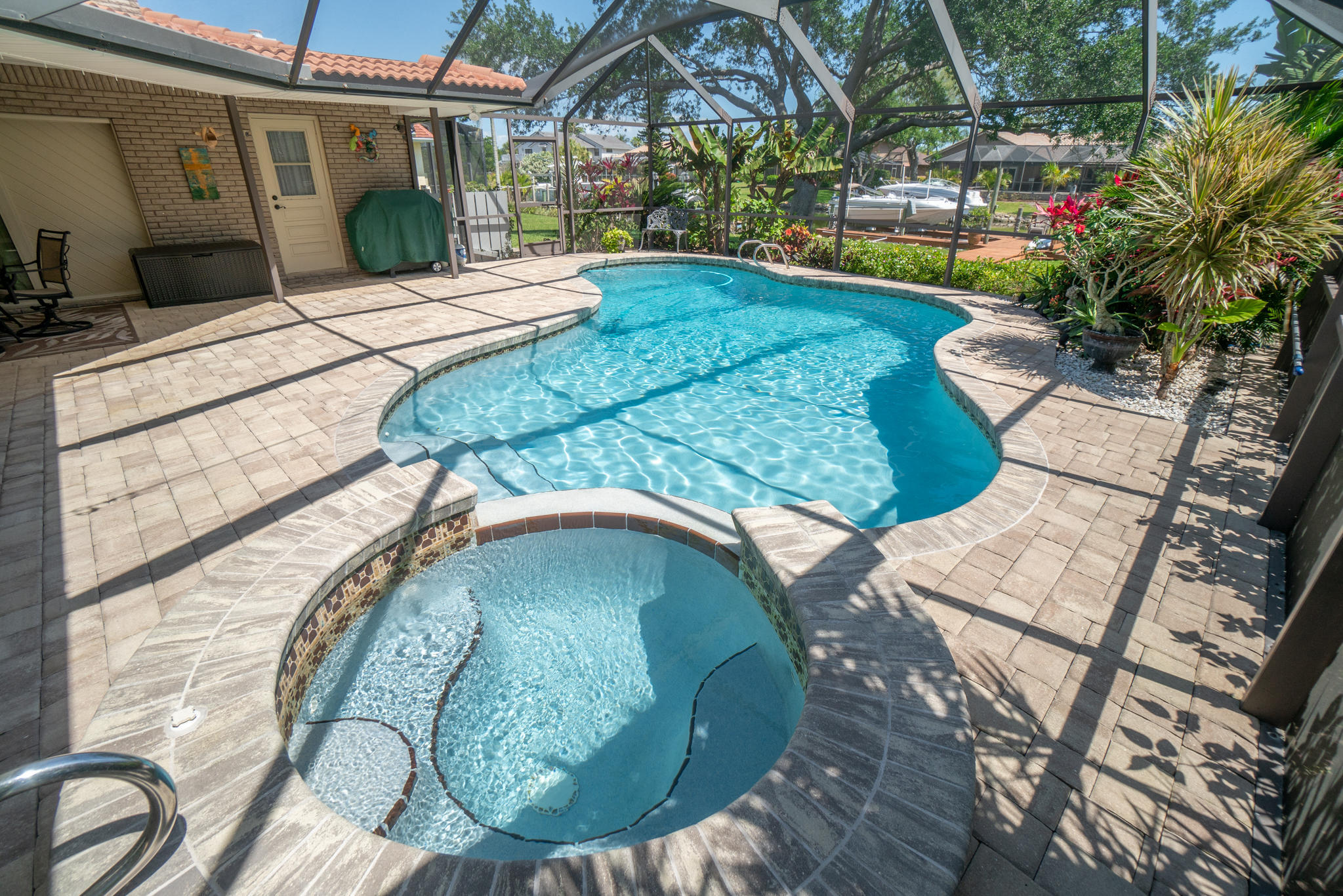 539 Lanternback Island Drive Satellite Beach, FL 32937 - Photo 38 of 54 a view of a swimming pool with a patio
