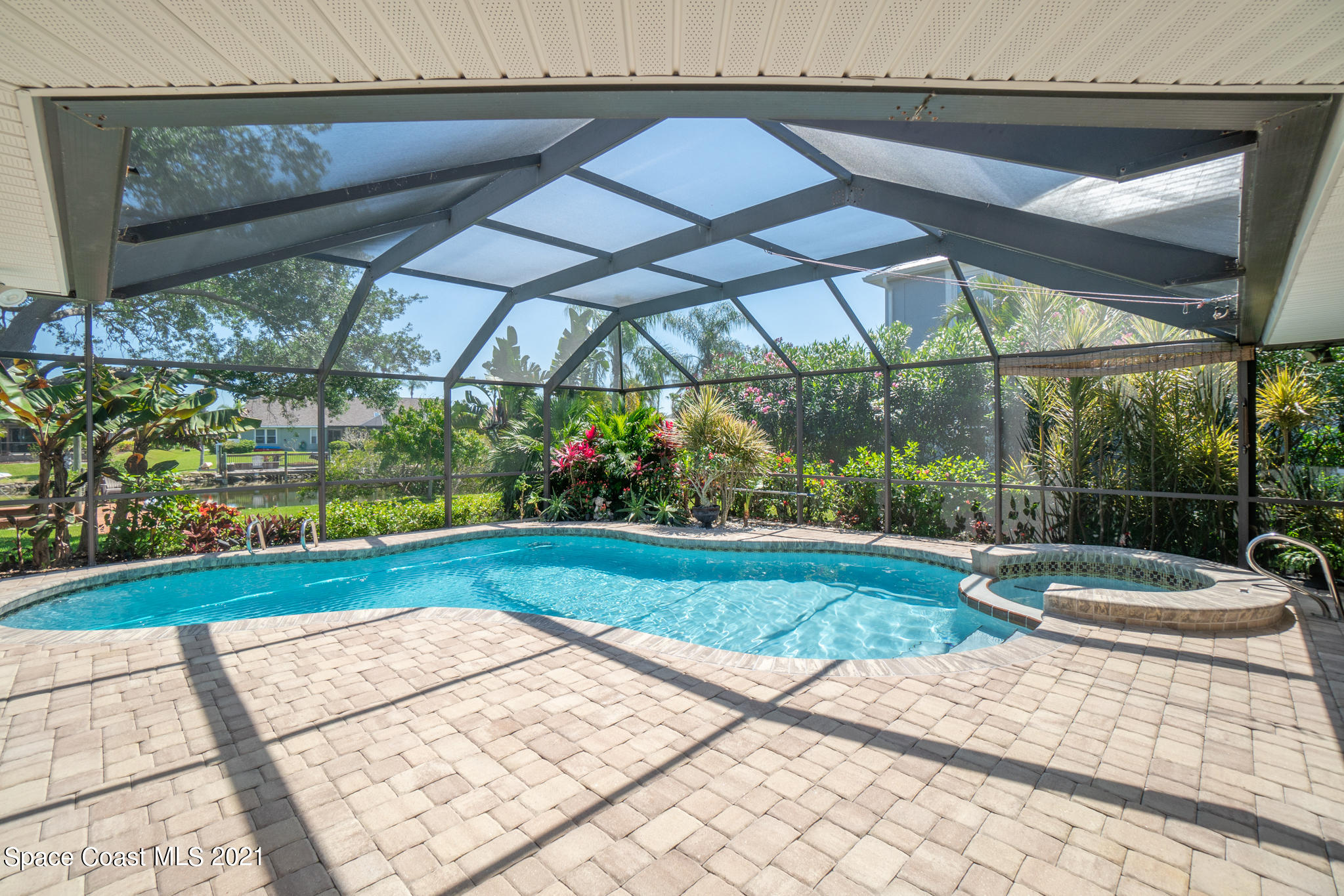 539 Lanternback Island Drive Satellite Beach, FL 32937 - Photo 39 of 54 a view of a backyard with sitting area