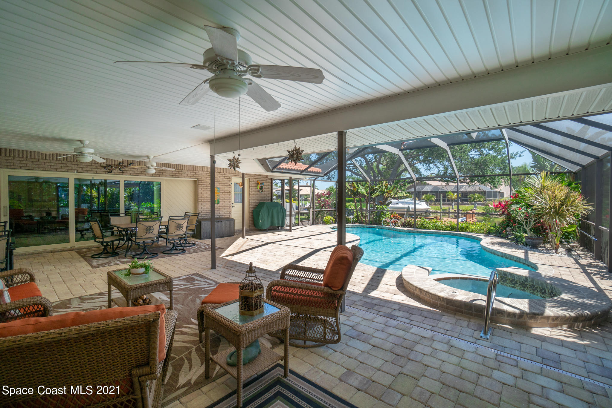 539 Lanternback Island Drive Satellite Beach, FL 32937 - Photo 42 of 54 a outdoor space with patio lots of furniture and garden view