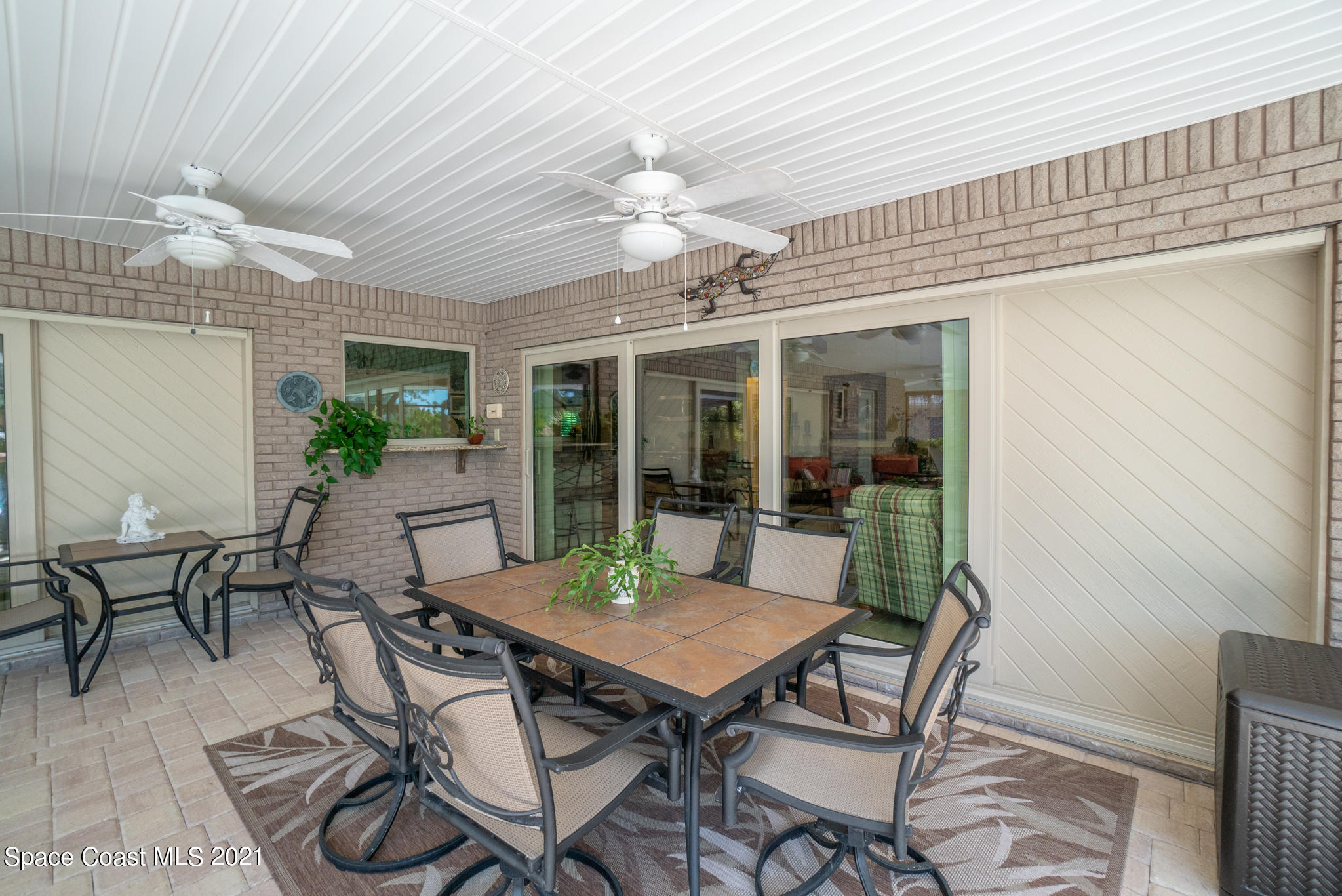 539 Lanternback Island Drive Satellite Beach, FL 32937 - Photo 45 of 54 a view of a dining room with furniture window and outside view