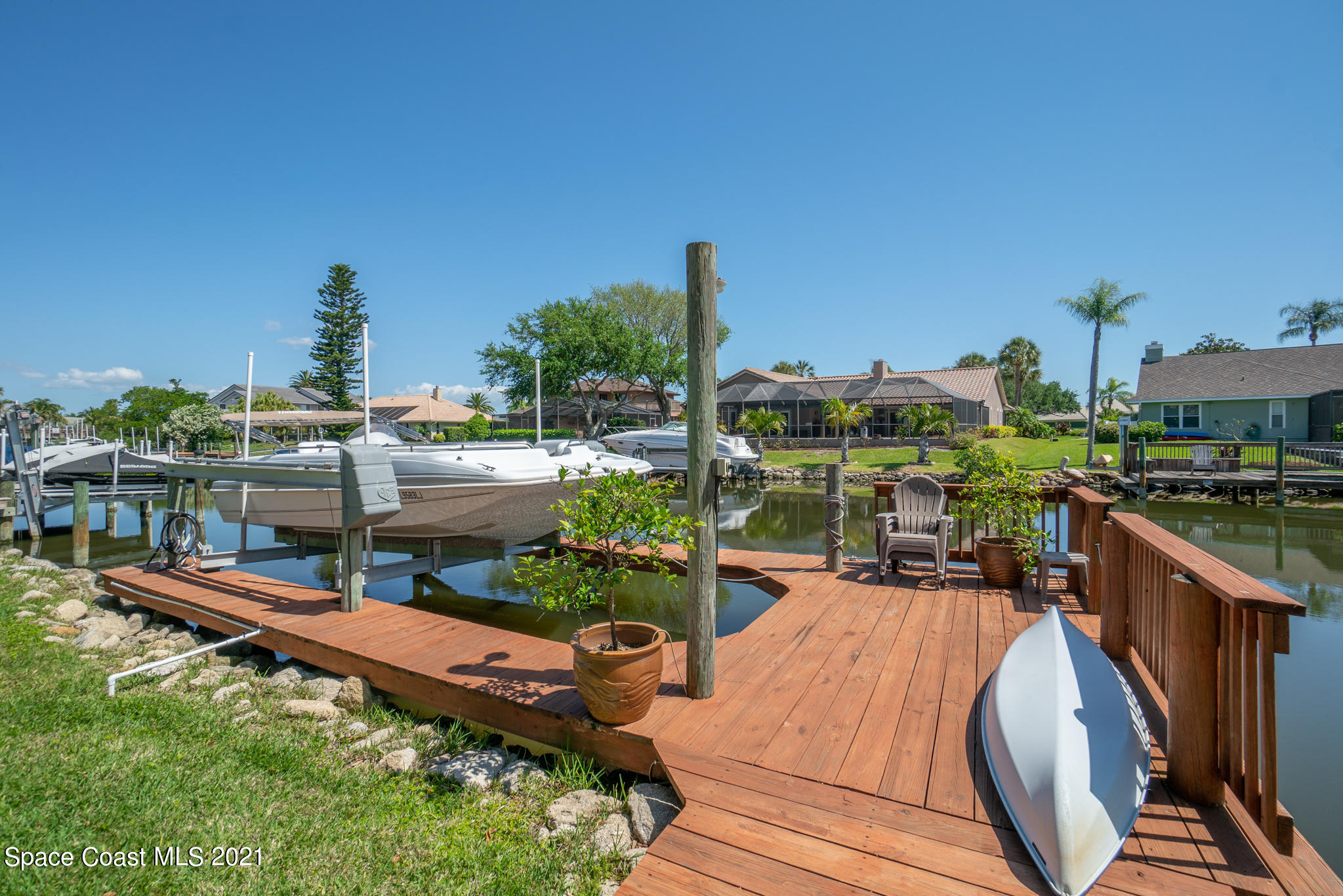 539 Lanternback Island Drive Satellite Beach, FL 32937 - Photo 48 of 54 a view of a swimming pool with a patio