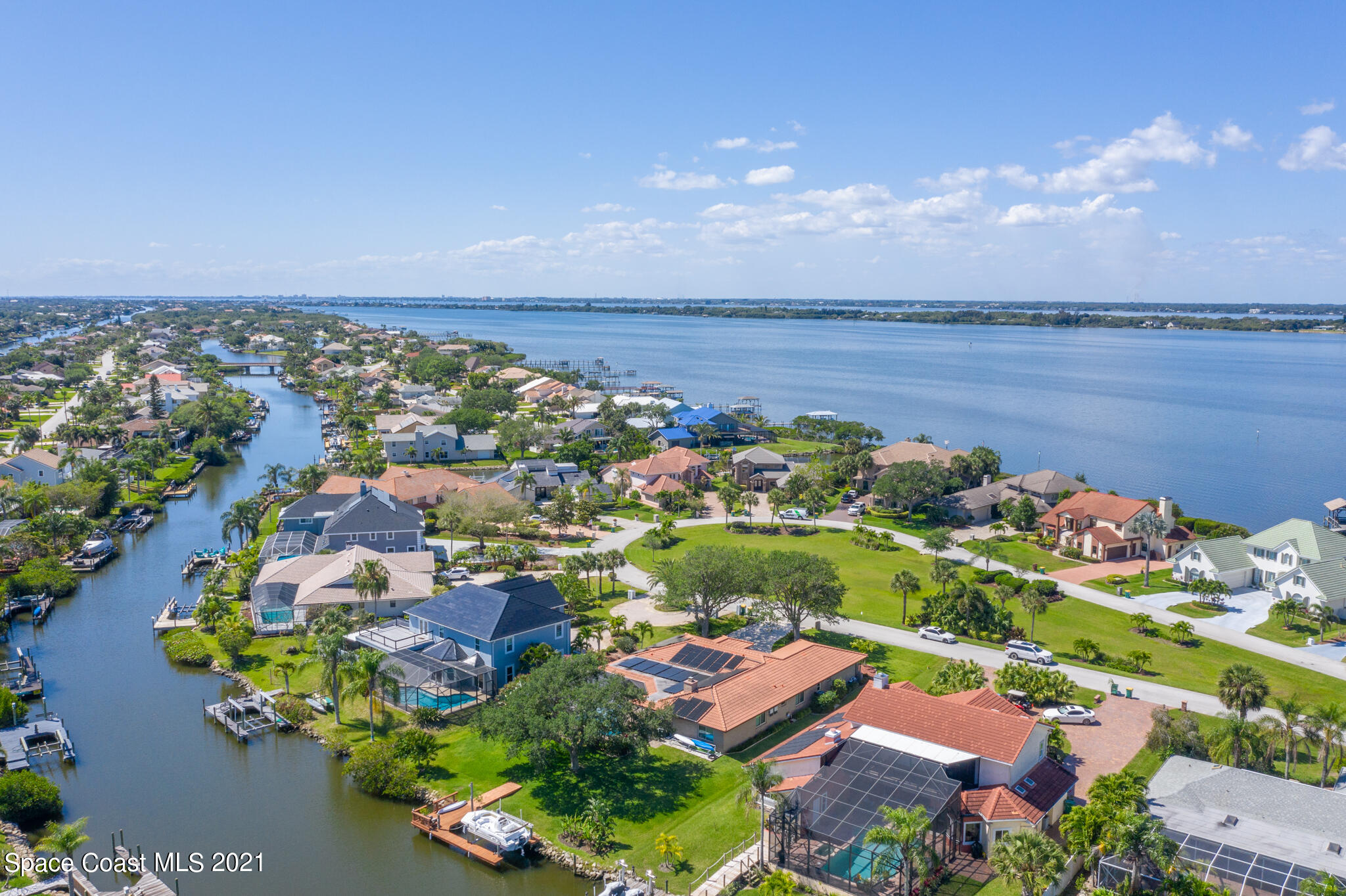 539 Lanternback Island Drive Satellite Beach, FL 32937 - Photo 50 of 54 an aerial view of ocean and residential houses with outdoor space