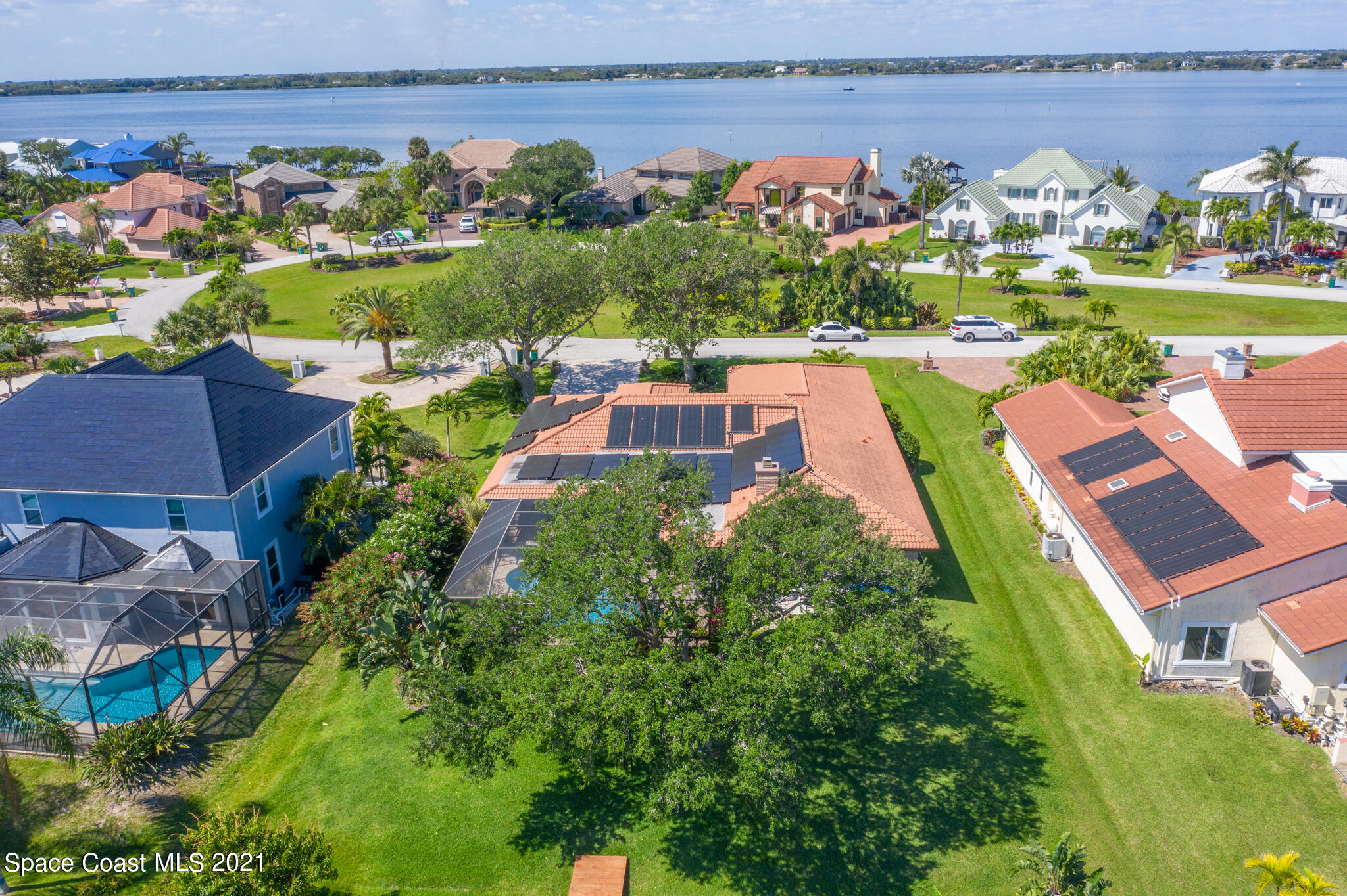539 Lanternback Island Drive Satellite Beach, FL 32937 - Photo 51 of 54 an aerial view of a houses with outdoor space and lake view