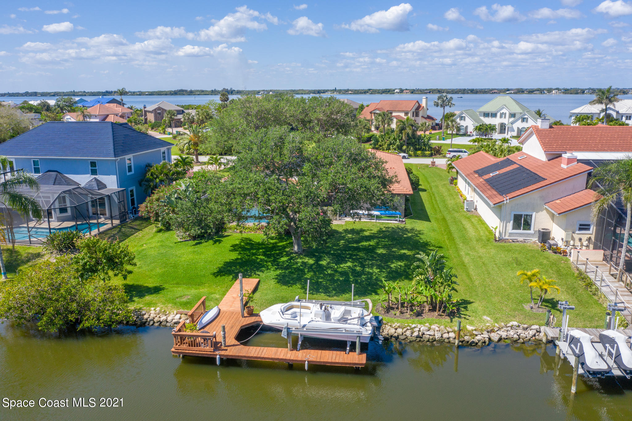 539 Lanternback Island Drive Satellite Beach, FL 32937 - Photo 52 of 54 an aerial view of residential houses with outdoor space