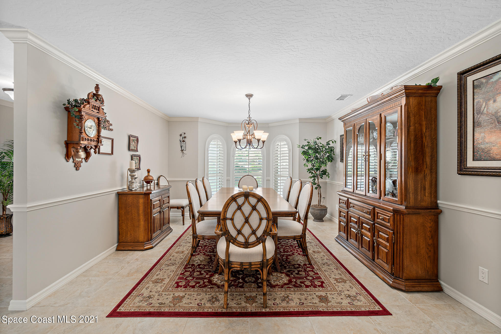 539 Lanternback Island Drive Satellite Beach, FL 32937 - Photo 8 of 54 a view of a dining room with furniture window and wooden floor