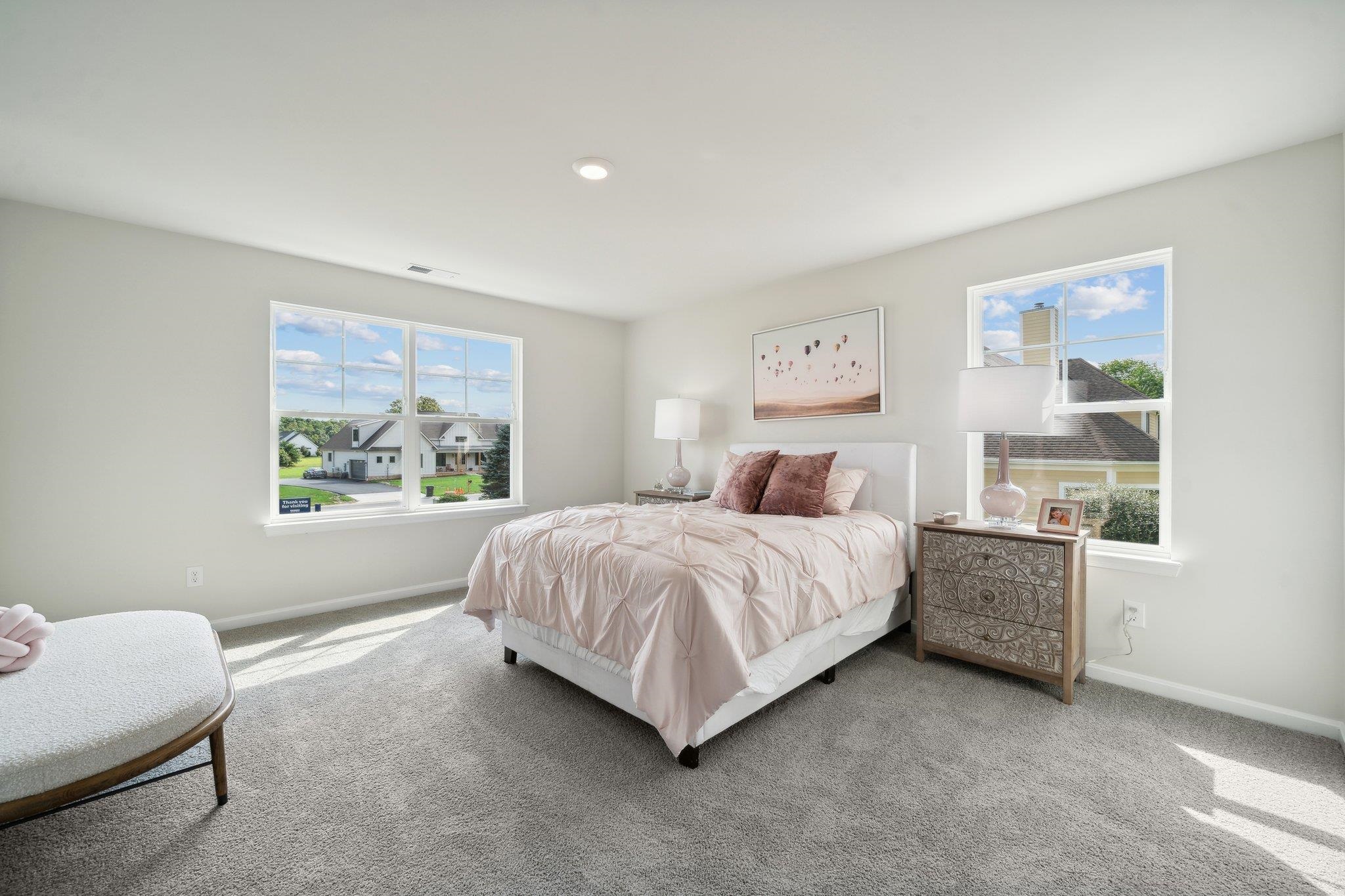 172 Liberty Lane Keswick, VA 22947 - Photo 16 of 21 a bedroom with a bed lamp and window