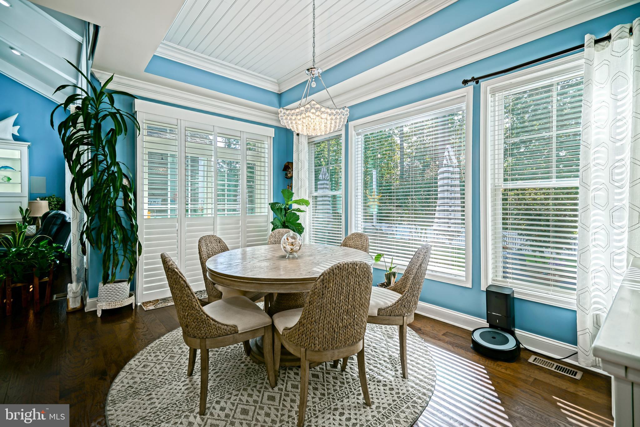 35236 Acadia Lane Lewes, DE 19958 - Photo 27 of 88 a view of a dining room with furniture window and wooden floor