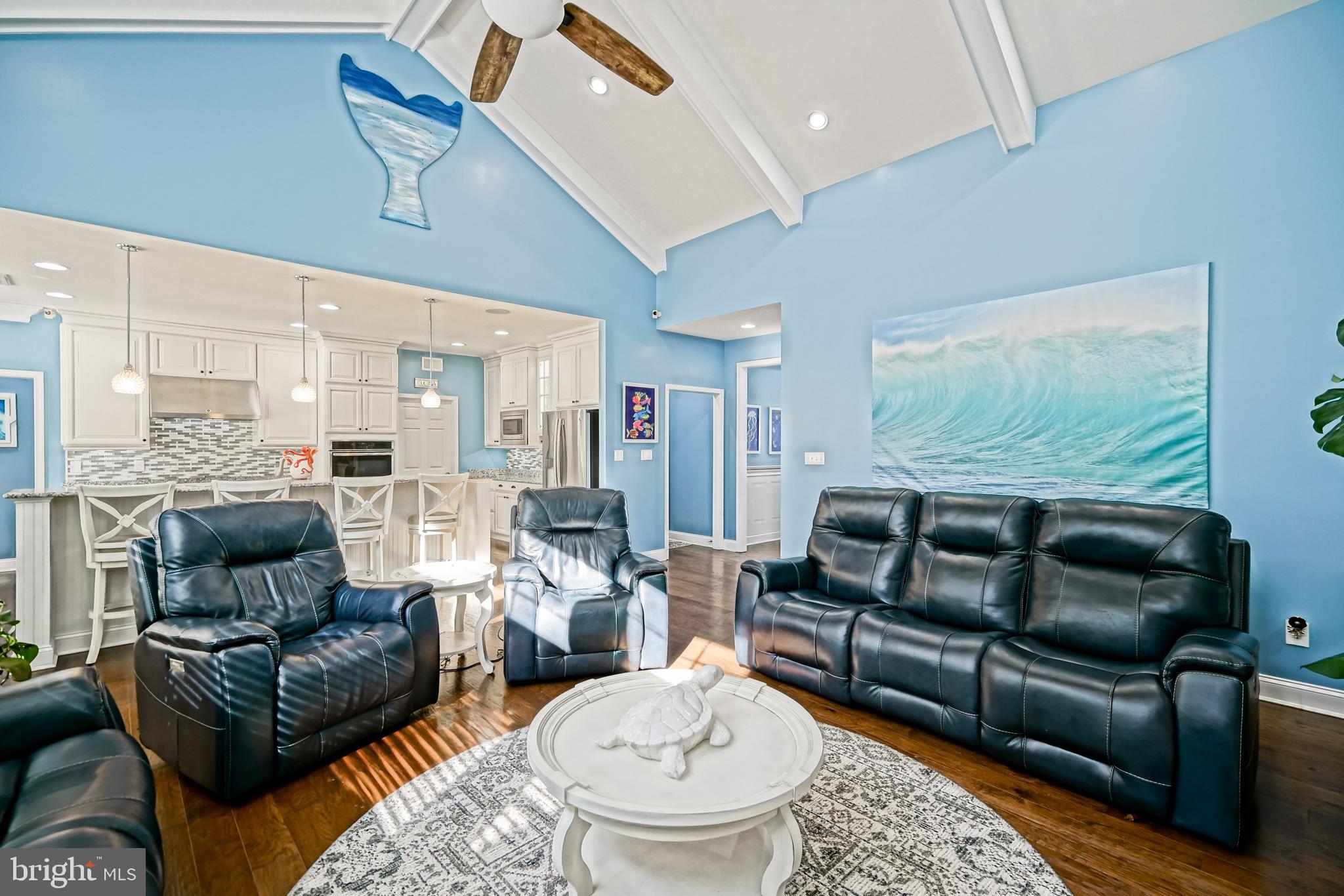 35236 Acadia Lane Lewes, DE 19958 - Photo 33 of 88 a living room with furniture and a large window