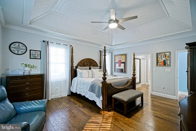 a view of a patio with couches chairs and a fire pit