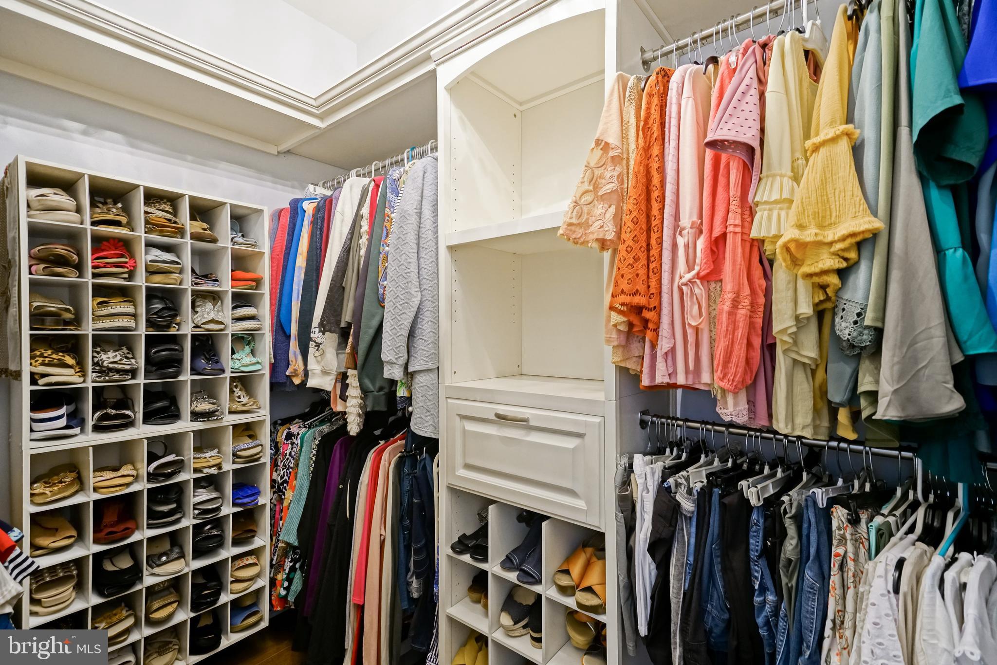 35236 Acadia Lane Lewes, DE 19958 - Photo 45 of 88 a view of walk in closet with clothes and shoes